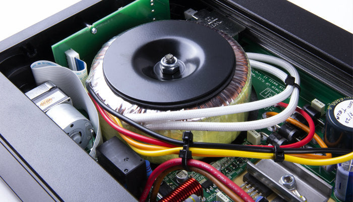 A product image of the inside of the Rega io integrated amplifier.