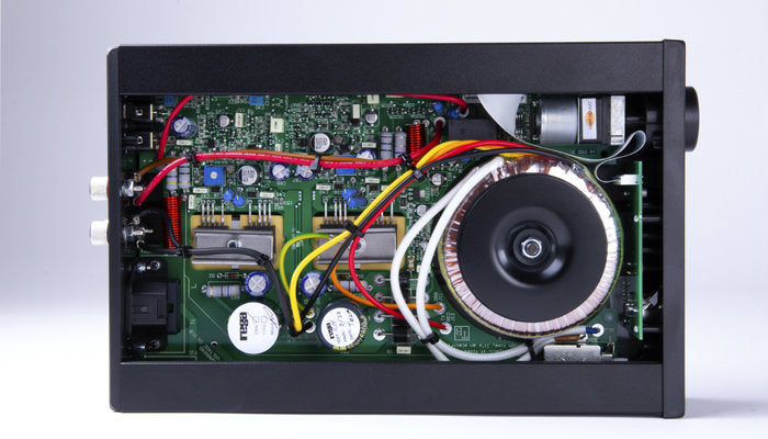 A product image of the inside of the Rega io integrated amplifier.