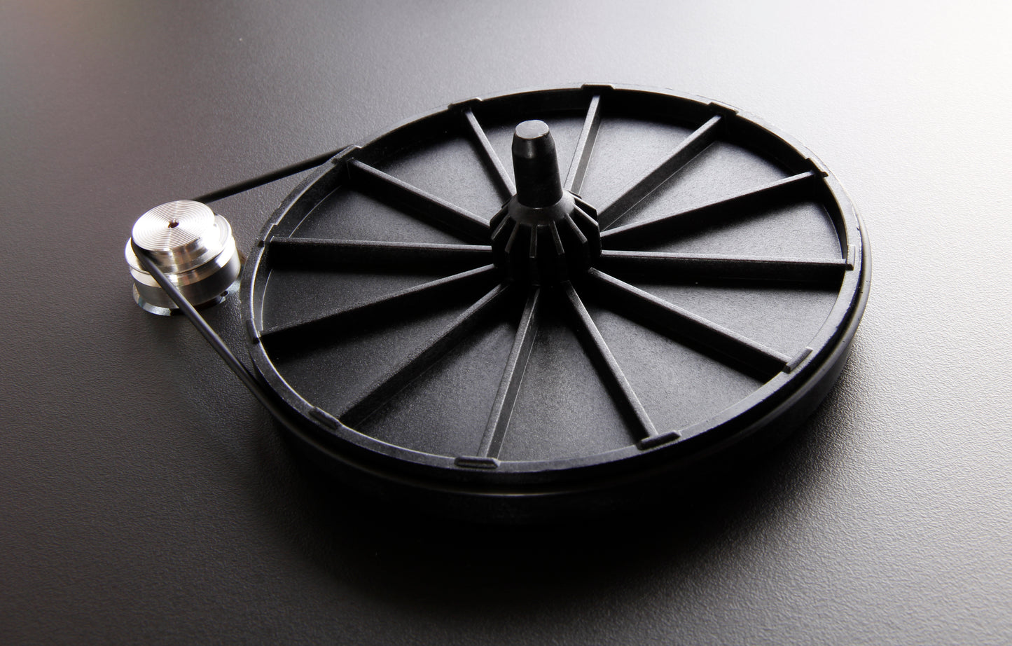 Product image for a drive belt on a Rega Planar 1 turntable in Matt Black finish