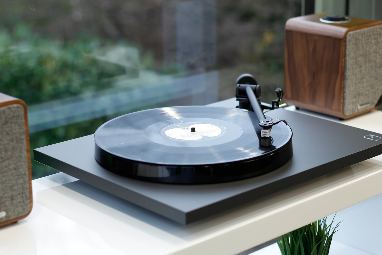 Product image for a Rega Planar 1 Plus turntable in Matt Black finish