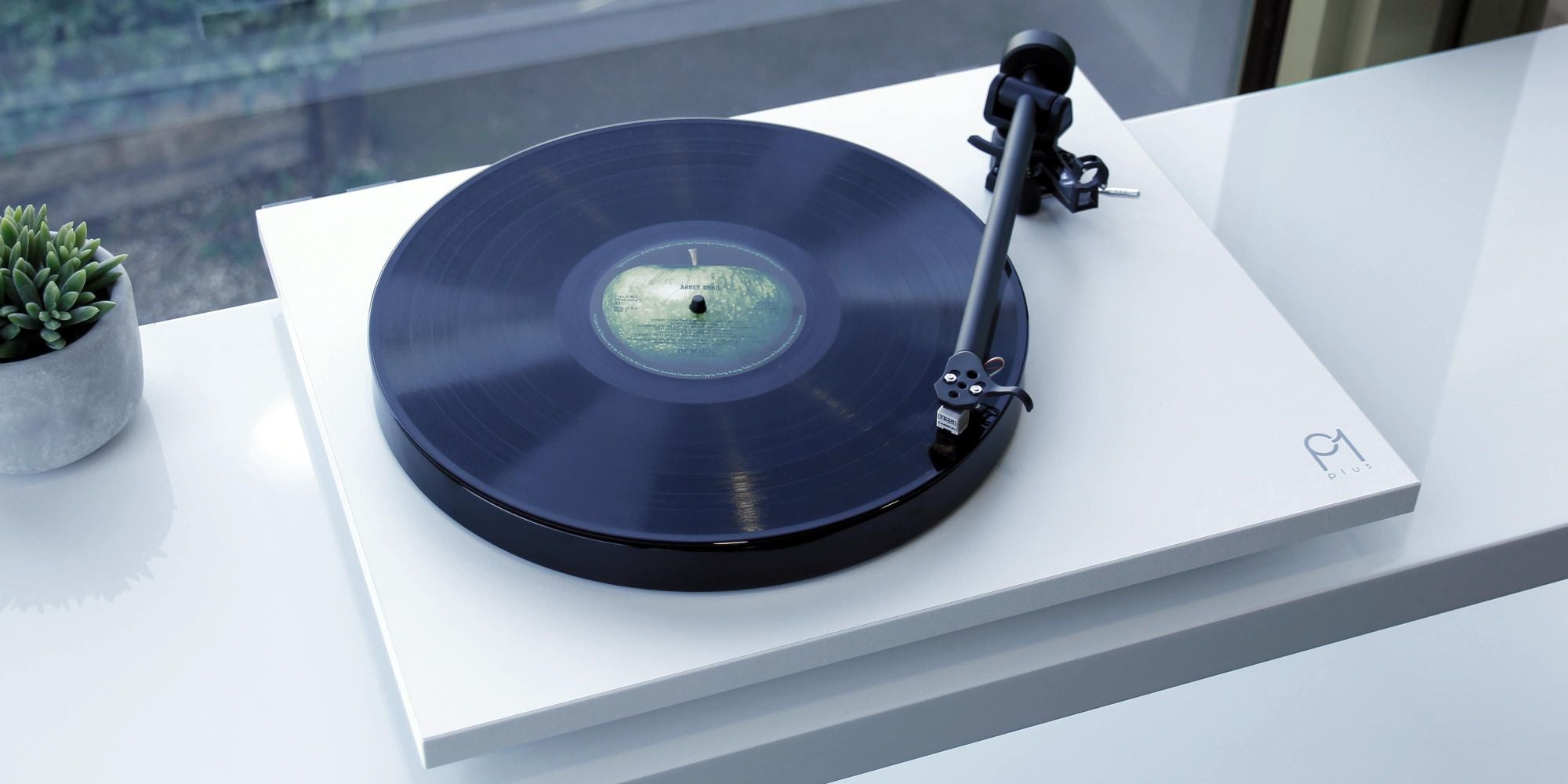 Product image for a Rega Planar 1 Plus Turntable in Matt White