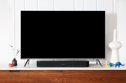 Lifestyle image of a Sonos Beam Gen 2 Soundbar in Black.