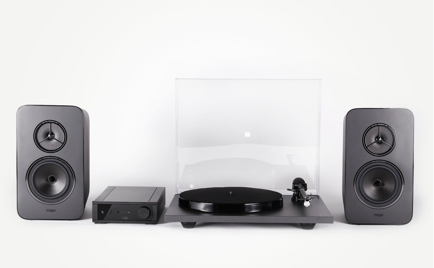 Product Image of a Rega System One turntable package featuring a Rega Planar 1 turntable, Rega io Integrated Amplifier and a pair of Rega Kyte Speakers.