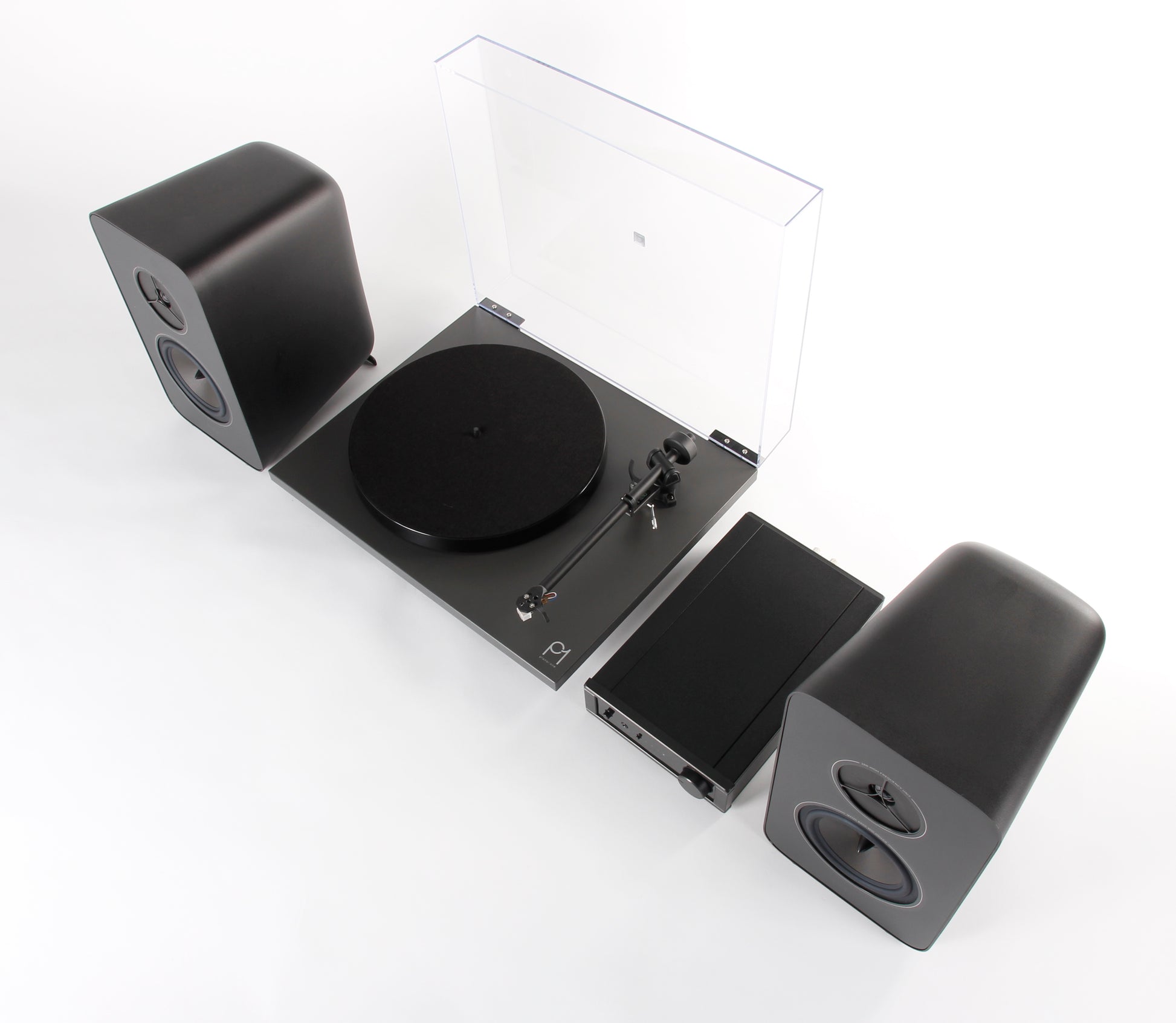Product Image of a Rega System One turntable package featuring a Rega Planar 1 turntable, Rega io Integrated Amplifier and a pair of Rega Kyte Speakers.
