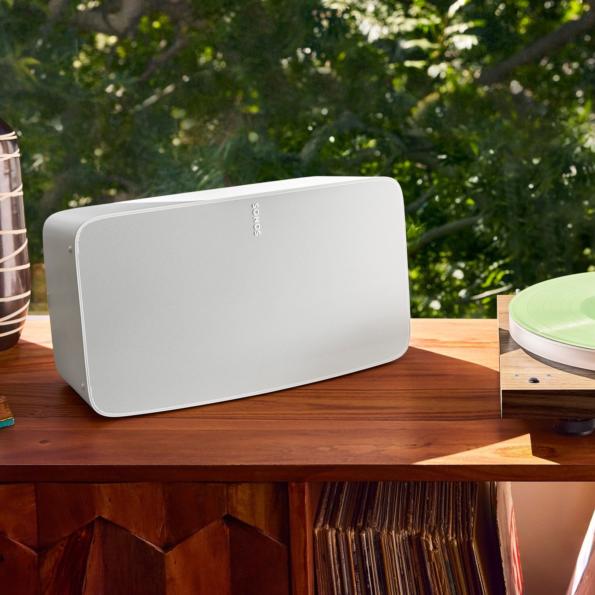 Lifestyle image of a Sonos Five wireless speaker in White.