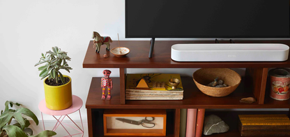 Lifestyle image of a Sonos Beam Gen 2 Soundbar in White.