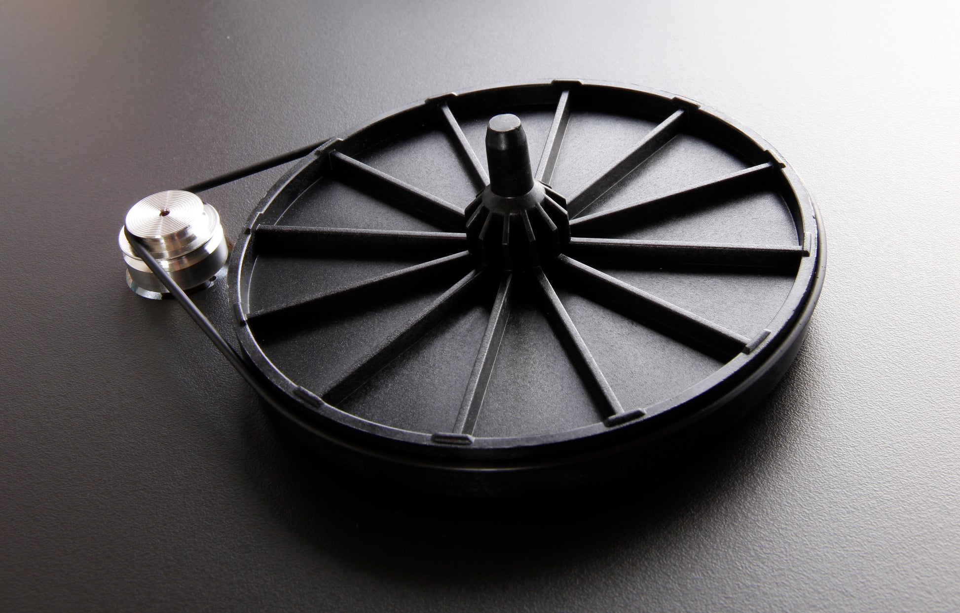 Product image for a drive belt on a Rega Planar 1 turntable in Matt Black finish