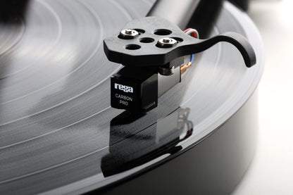 Product image of a Rega Carbon Pro Stylus playing a record.